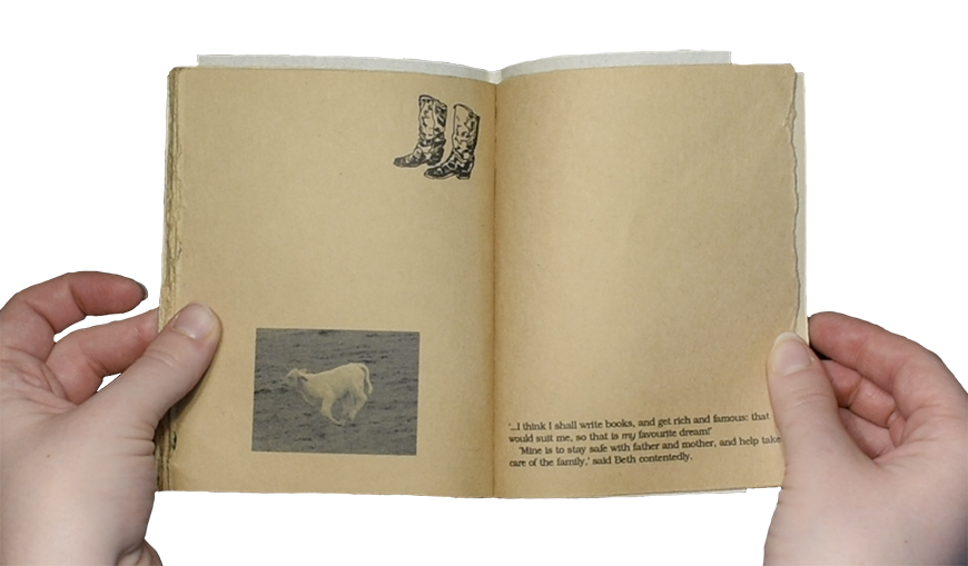 A person open a book to two pages. One page has text, and one page has a photograph of a cow and an illustration of cowboy boots.