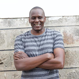 headshot of Joe Muturi