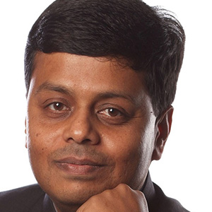 headshot of Aromar Revi