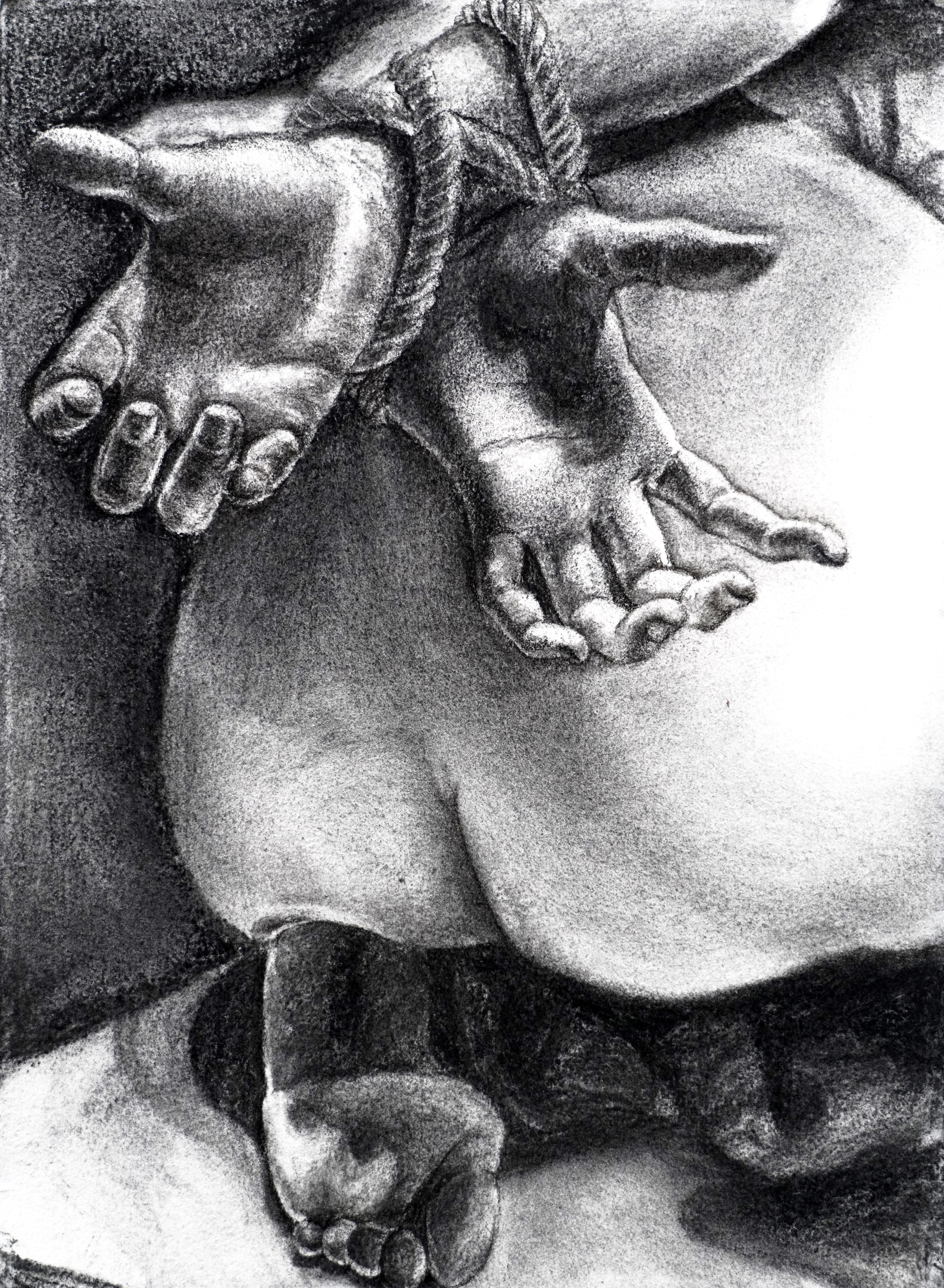 Charcoal drawing of a body.