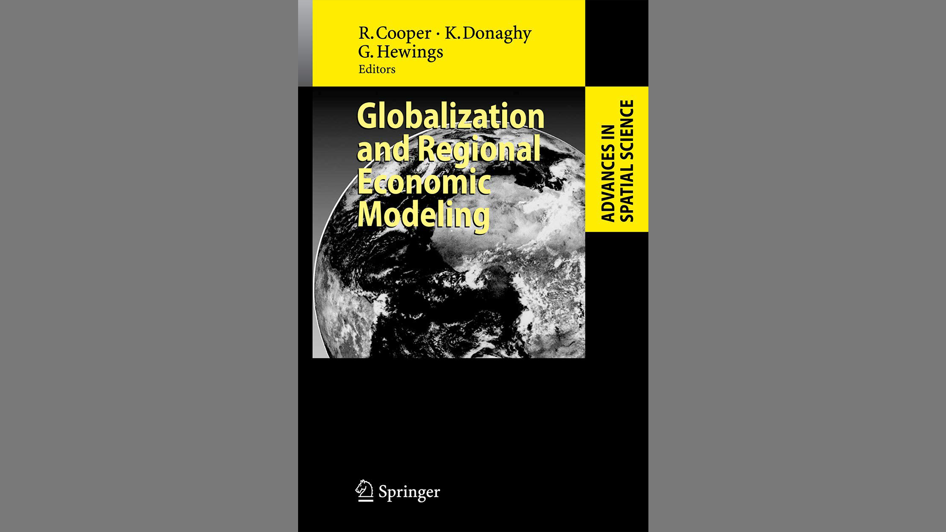 Book cover with a black and white image of the earth in the background and yellow and black text.