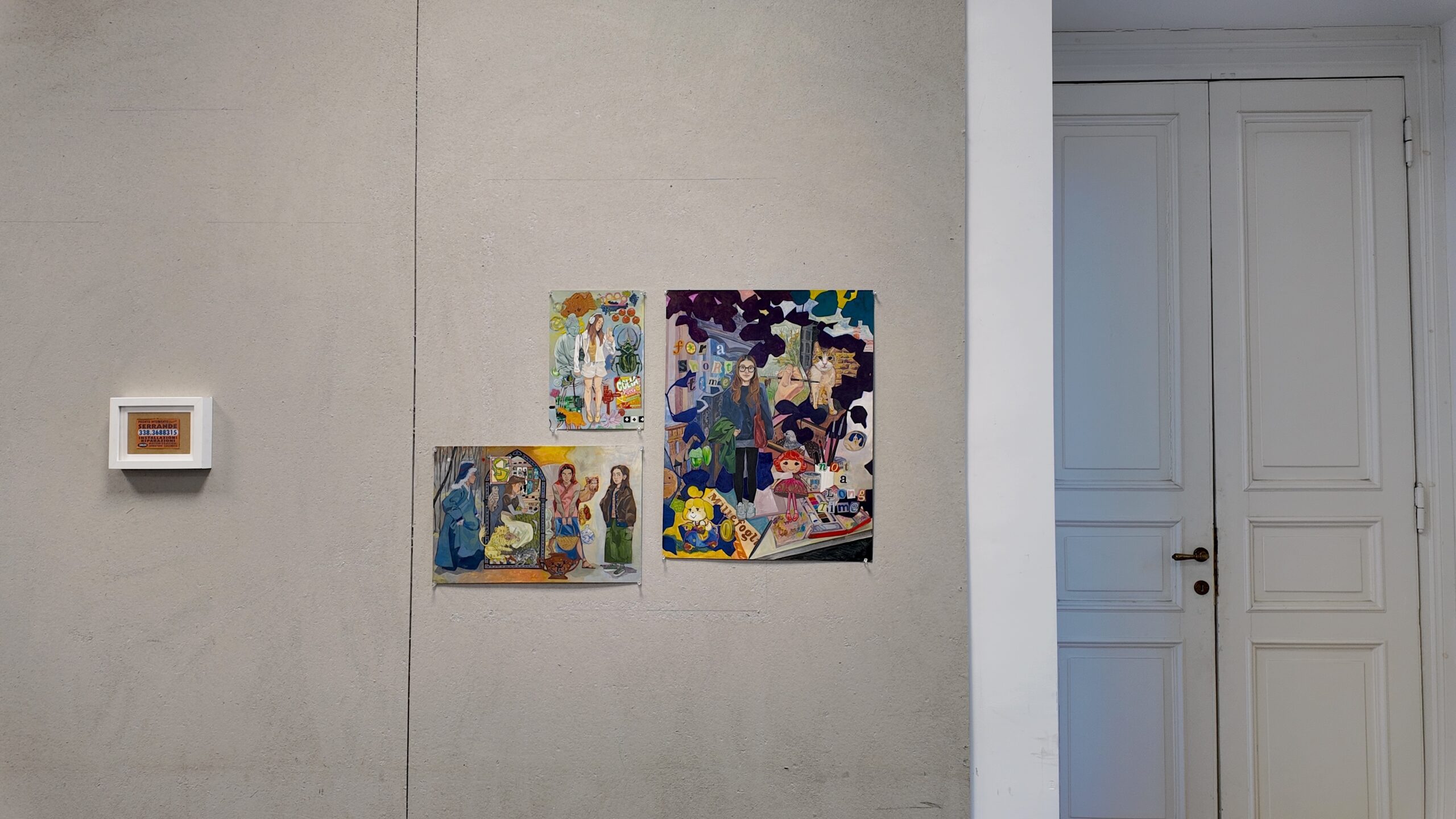 three paintings hung on a white wall