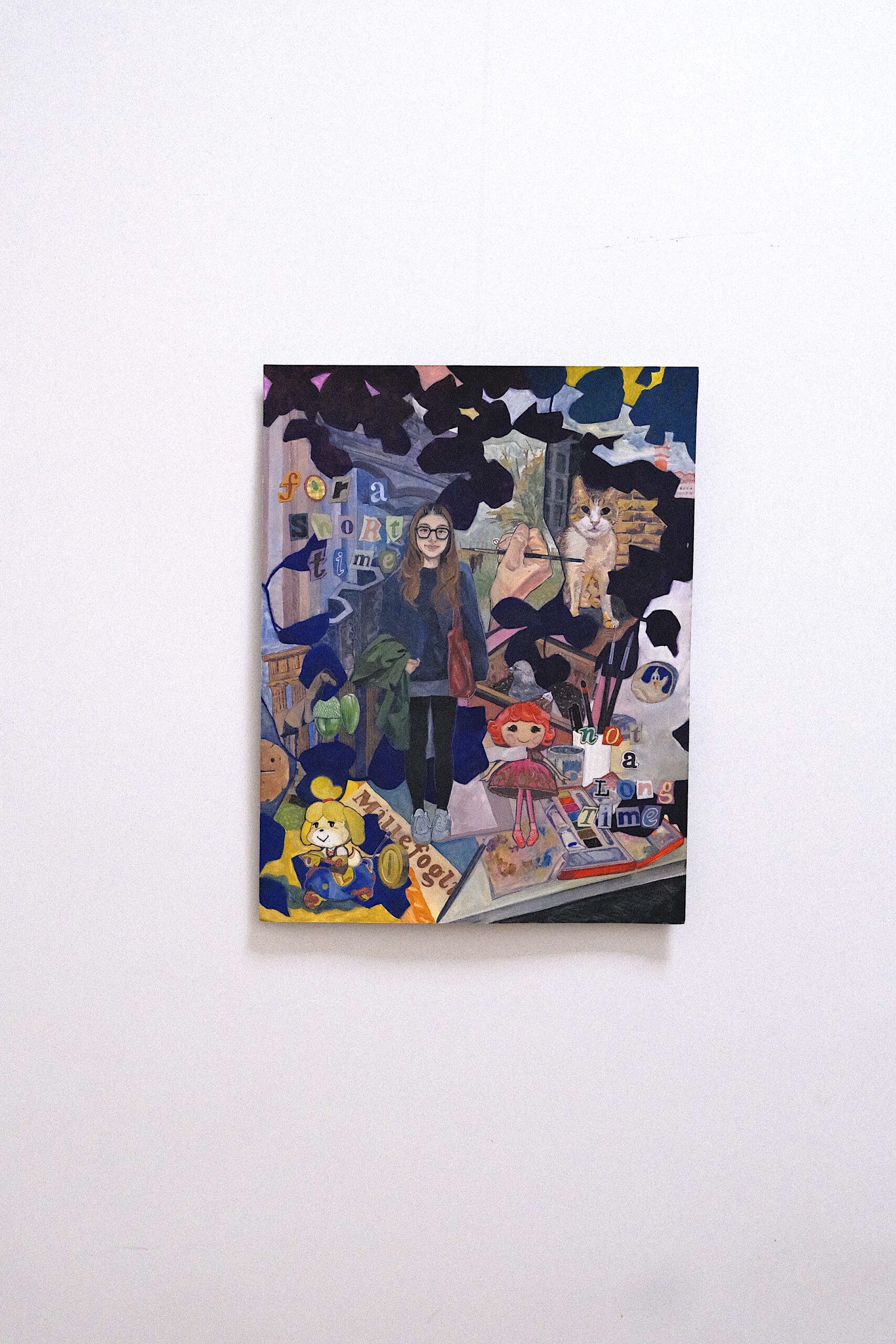 a painting hung on a white wall