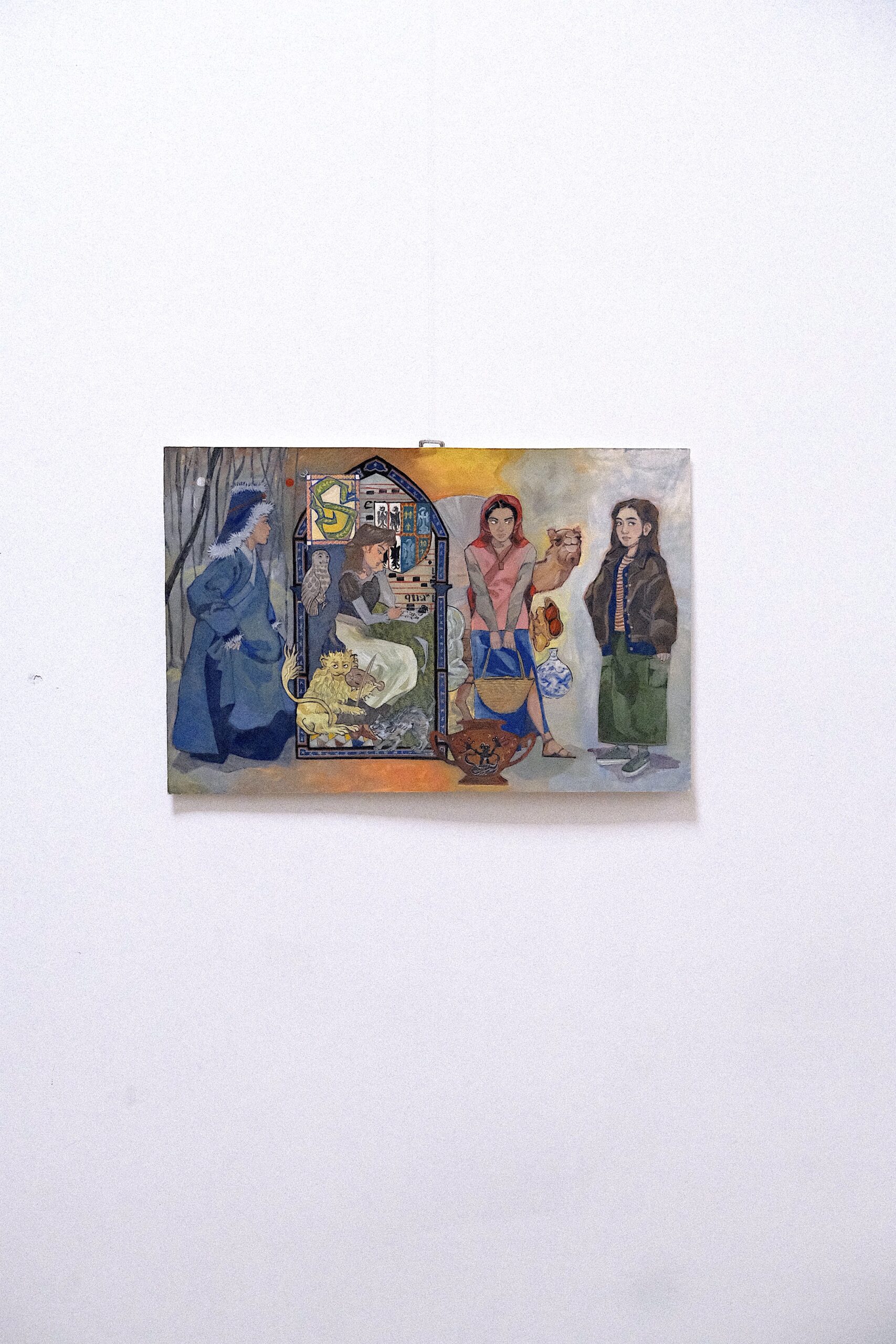 a painting hung on a white wall