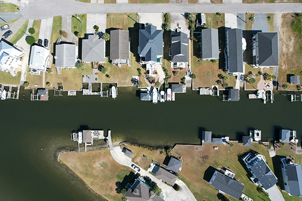 Aerial view of waterfront houses.