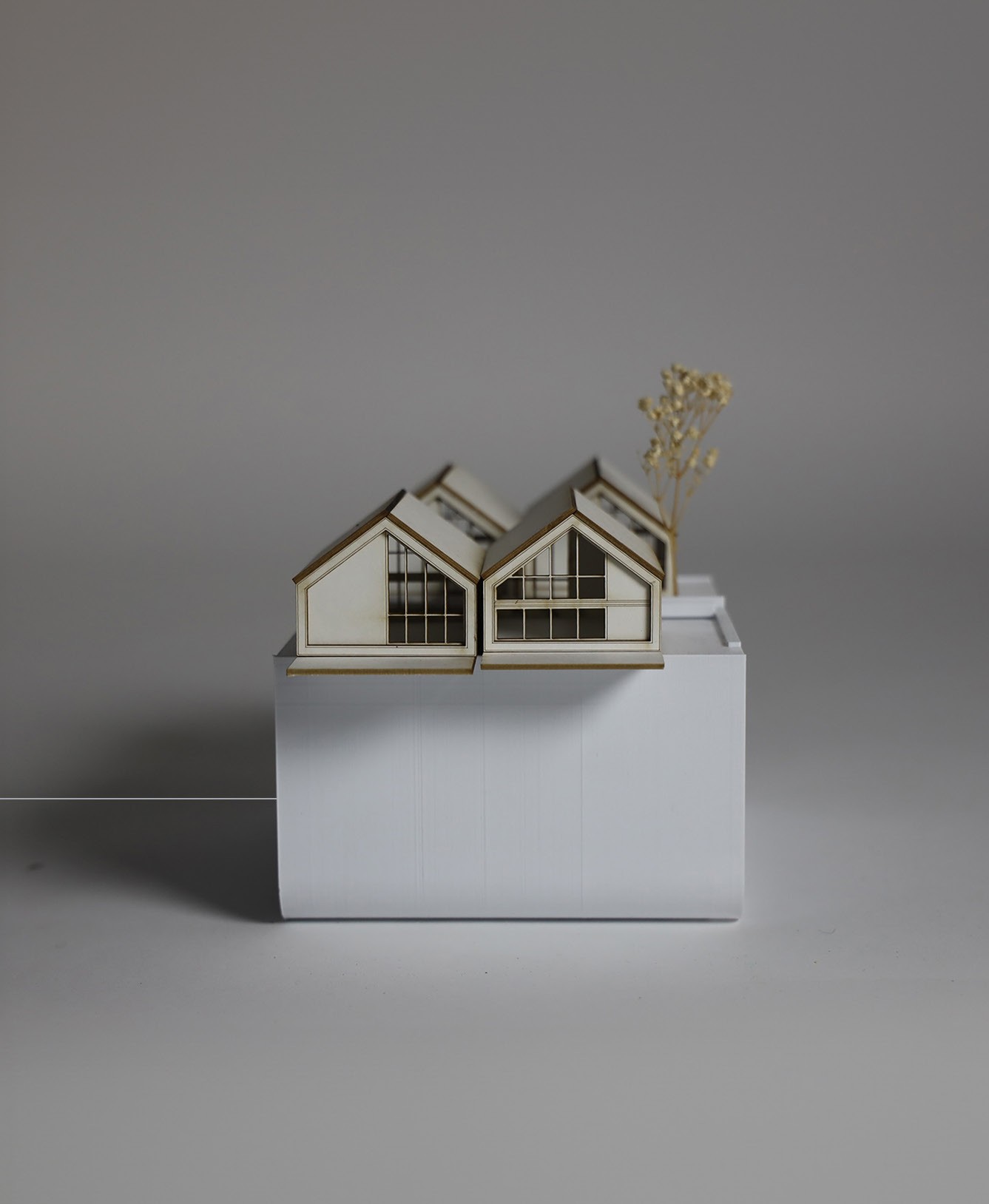 an architectural model of house-like structures