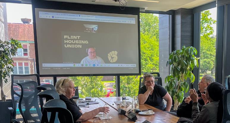 people meeting at a conference table