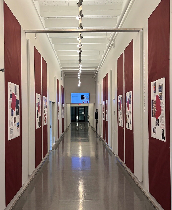 a hallway lined with posters